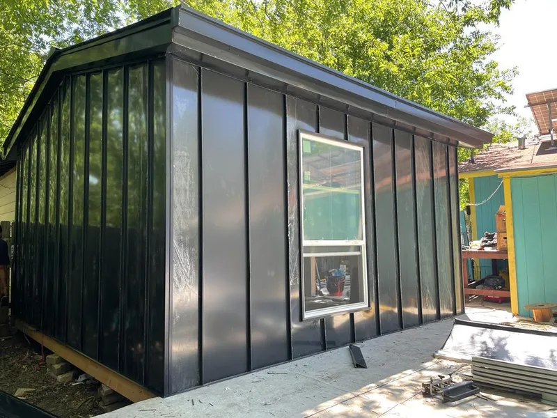 Black standing seam metal wall panels for Roof Inspection in Bagley