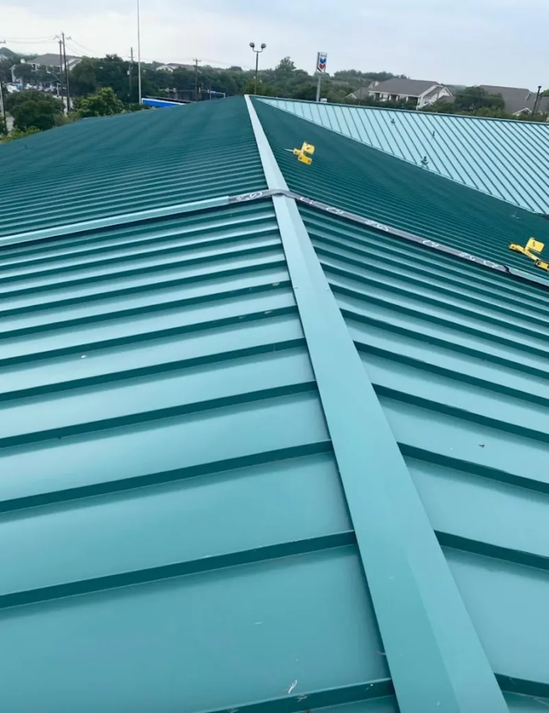 Green commercial metal roof ridge and valley for Metal Roof Repair in Bagley