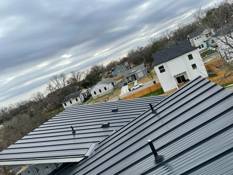 Standing seam metal roof panels with vents for Skylight Repair in Bagley